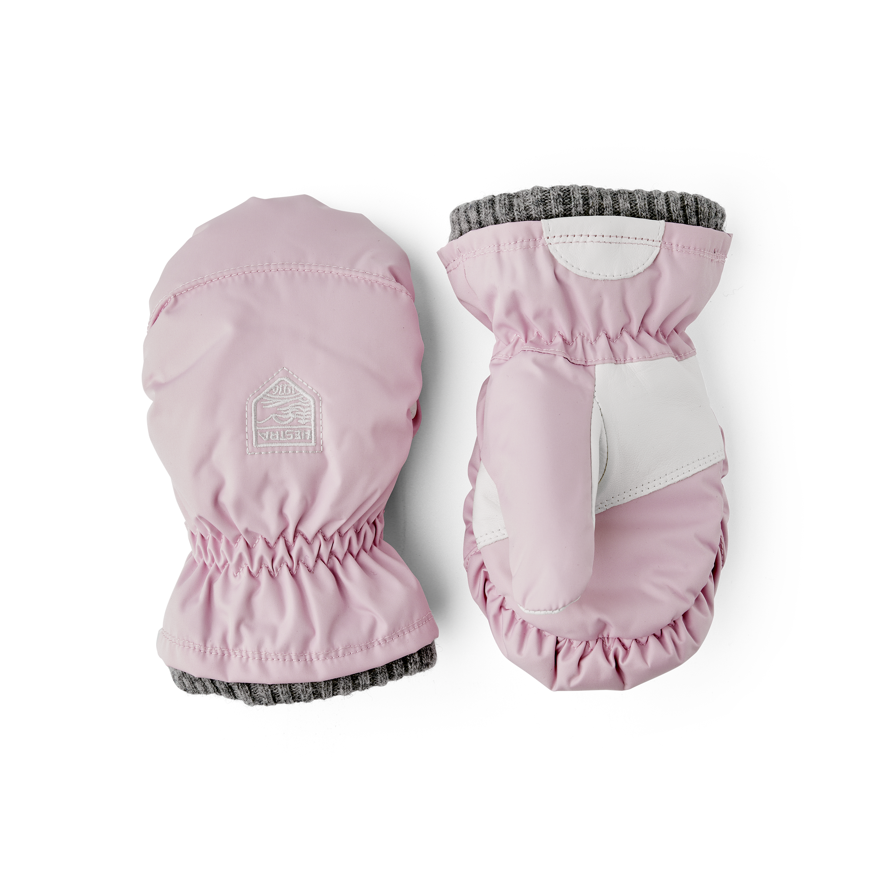 Light pink fabric mitten with gray cuff and white hairsheep palm
